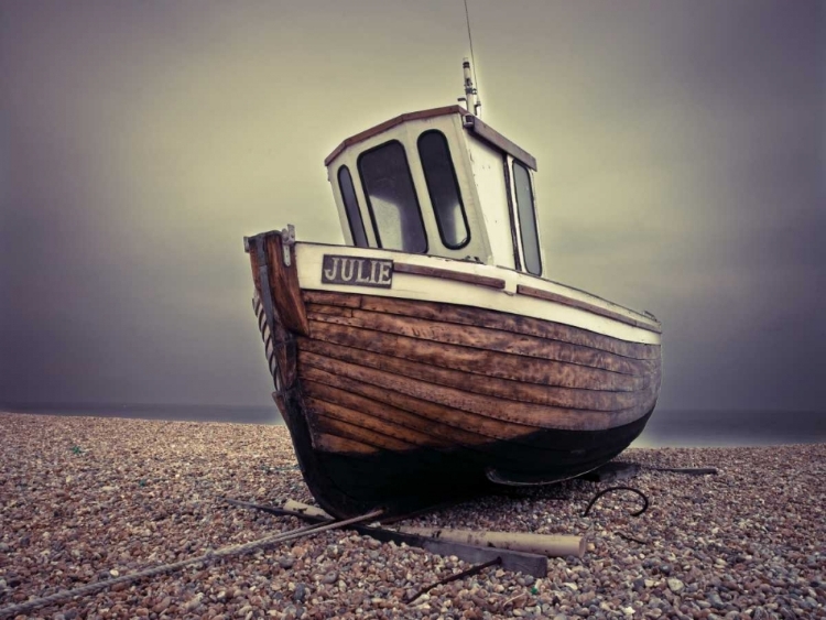 Picture of BOAT MOORED ON PEBBLED BEACH