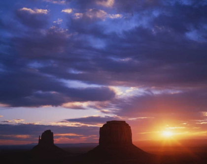 Picture of AZ, MONUMENT VALLEY SUNRISE ON STONE FORMATIONS