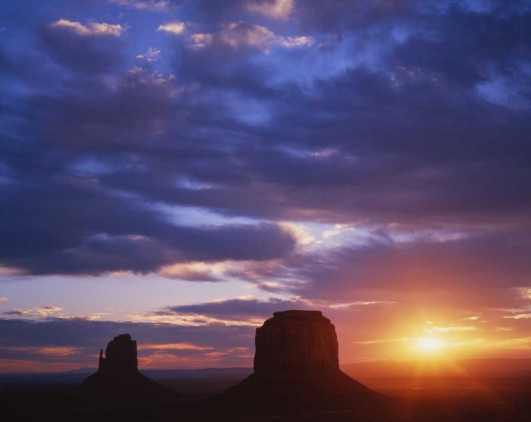 Picture of AZ, MONUMENT VALLEY SUNRISE ON STONE FORMATIONS