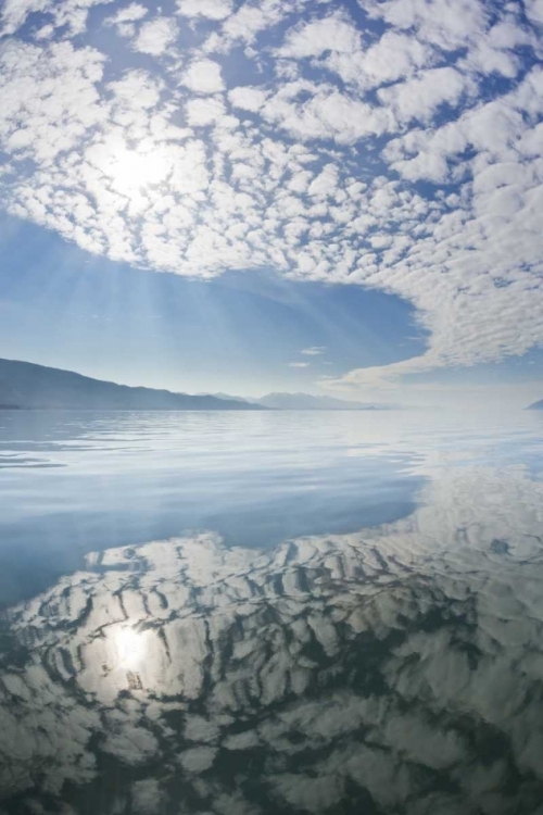 Picture of ALASKA, FRESHWATER BAY CLOUDS REFLECTED IN WATER