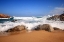 Picture of WHITE SEA FOAM ON RED ROCKS BEACH 