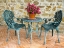 Picture of ITALY-CHIANTI TABLE AND CHAIRS WITH A FLOWERING BEGONIA 