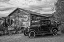 Picture of VINTAGE CAR IN FRONT OF OLD GAS STATION