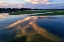 Picture of ITALY-MANTOVA (MANTUA) SUNSET REFLECTION AND BOAT ON LAKE