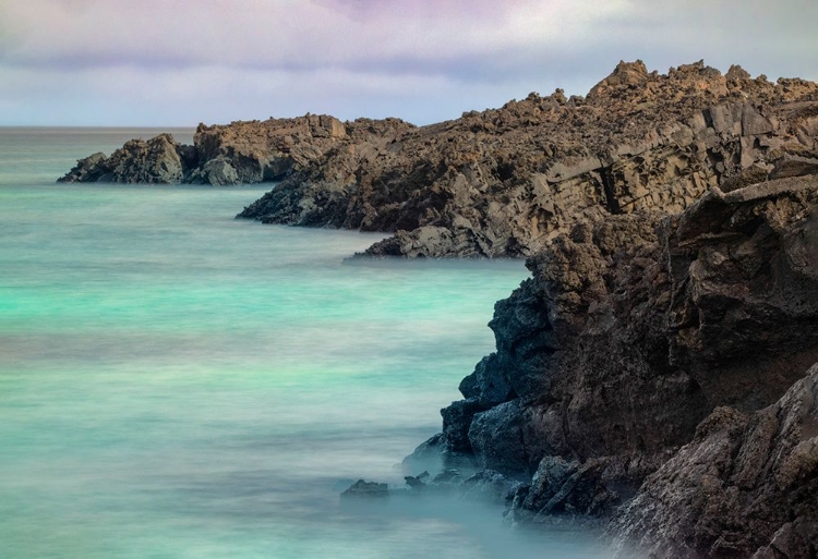 Picture of LAVA ROCKS ALONG TRANQUIL SHORELINE OF SAN CRISTOBAL ISLAND-GALAPAGOS-ECUADOR