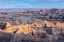 Picture of FORMATIONS OF STRIATED HOODOO LEAD THE EYE TO A PLATEAU AND MORE PEAKS