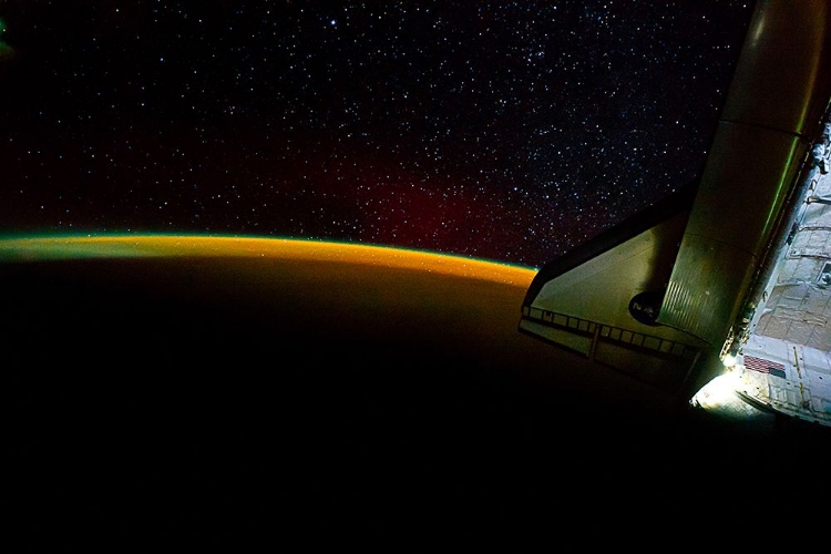 Picture of EARTH’S ATMOSPHERE OFF THE WING OF THE SPACE SHUTTLE ENDEAVOUR