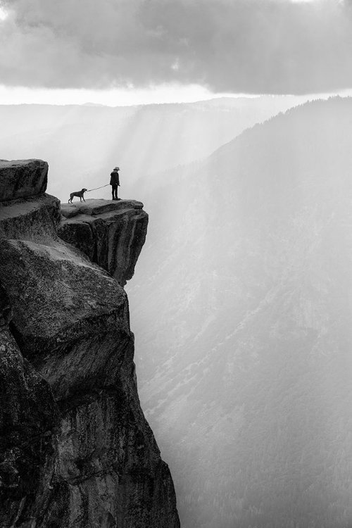 Picture of WOMAN AND DOG ON CLIFF