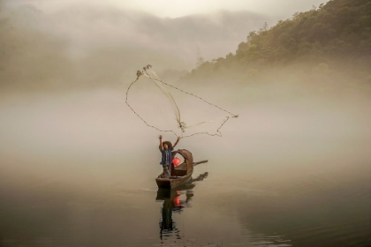 Picture of A FISHERMAN IN THE MORNING MIST