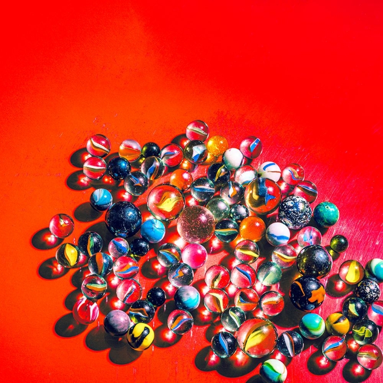 Picture of MARBLES ON VIBRANT RED