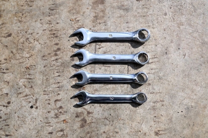 Picture of 4 WRENCHES AND TIRE MARKS