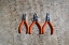 Picture of THREE ORANGE HANDLED PLIERS